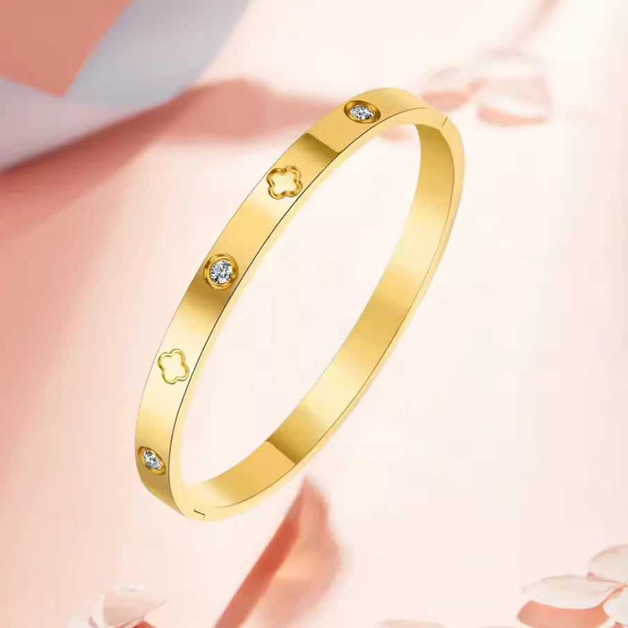 Stainless-steel gold bangle with sparkling zircon accents