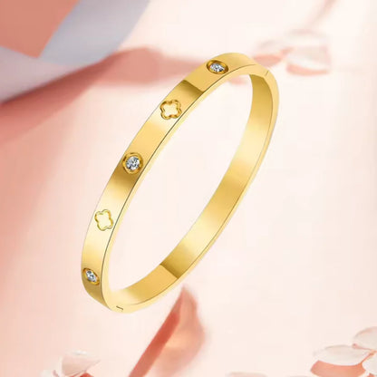 Stainless-steel gold bangle with sparkling zircon accents