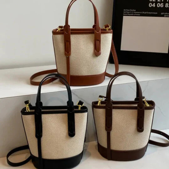 Durable canvas with smooth synthetic leather — modern everyday tote