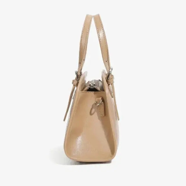 soft structured leather crossbody bag beige side view