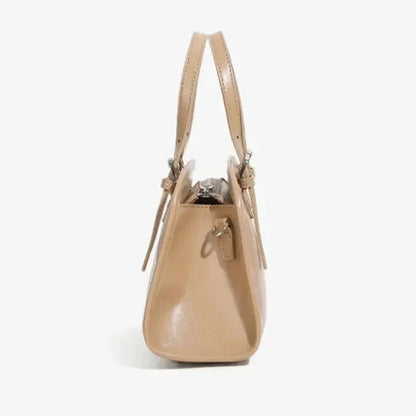 soft structured leather crossbody bag beige side view