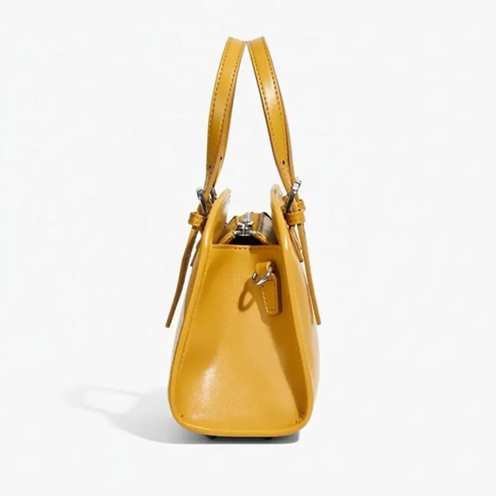 soft structured leather crossbody bag yellow side view