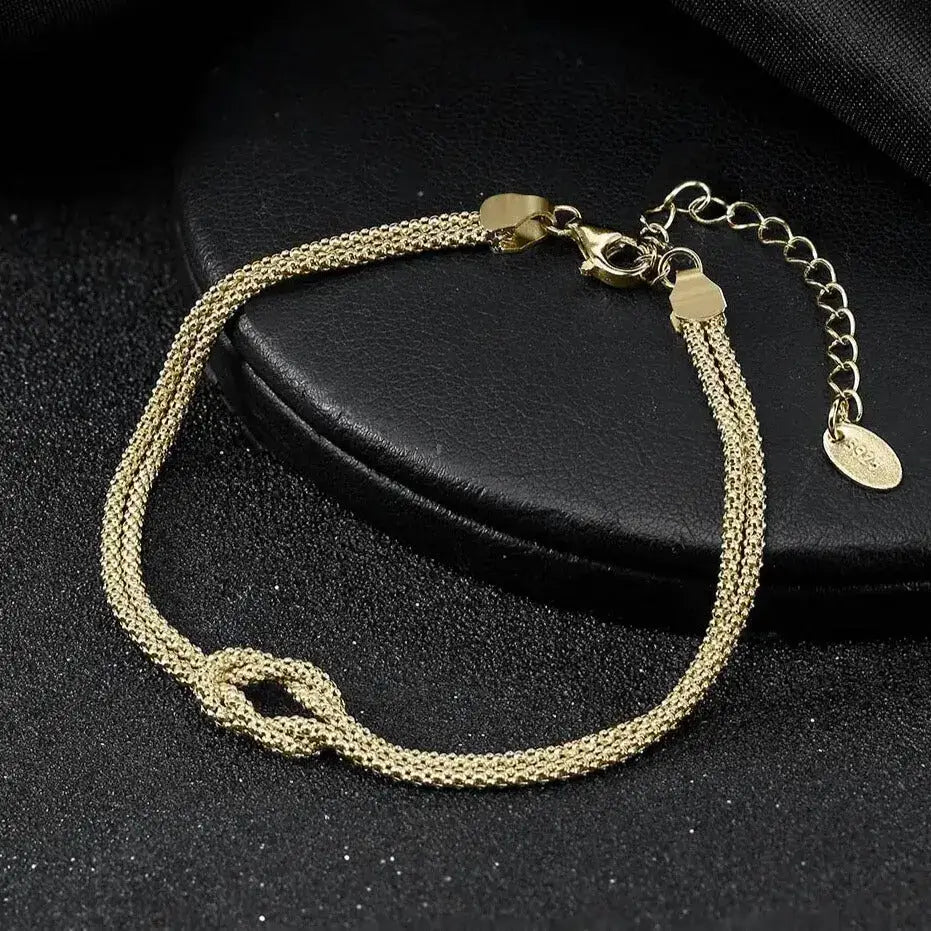 elegant gold bracelet interlaced chain