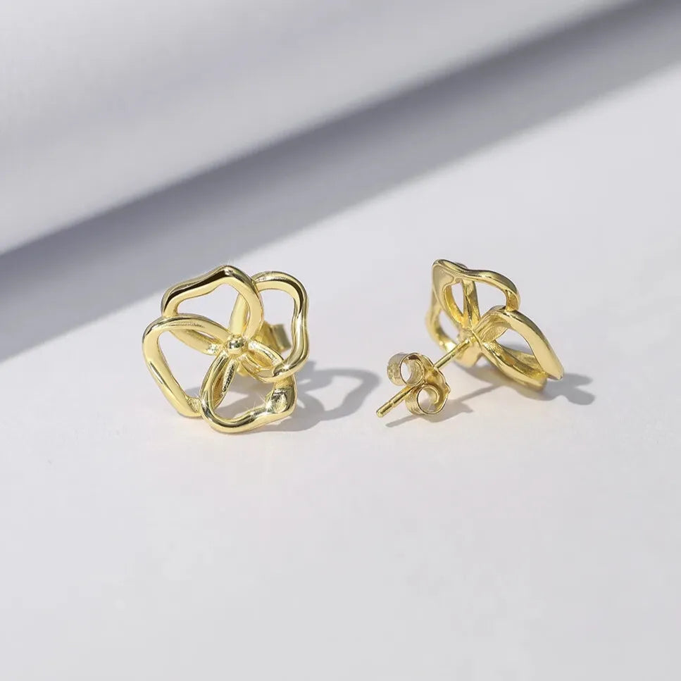 gold floral stud earrings butterfly back fastening detail