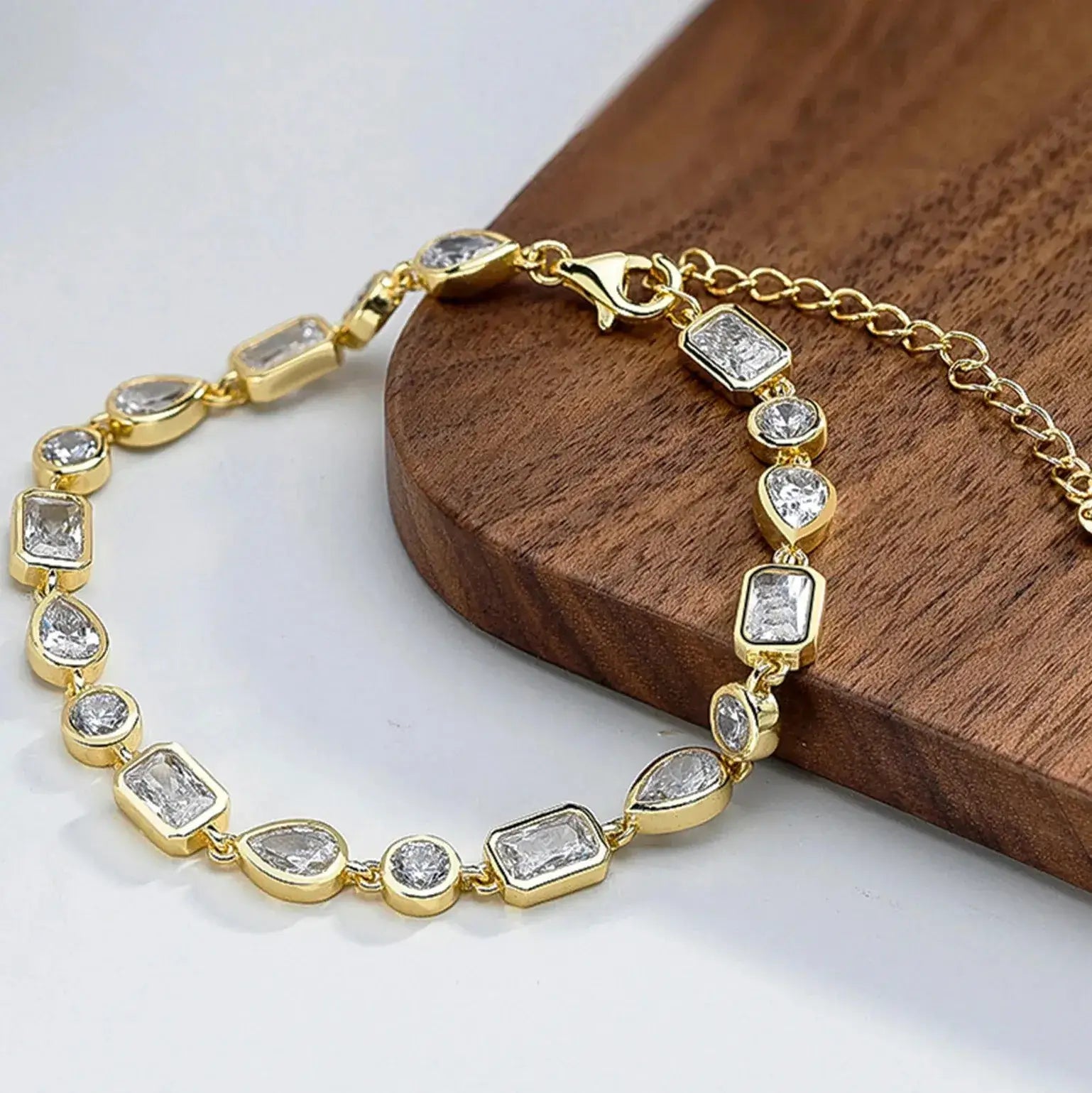 elegant gold bracelet with cubic zirconia