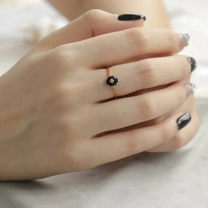 model wearing vintage black agate ring in gold vermeil on hand