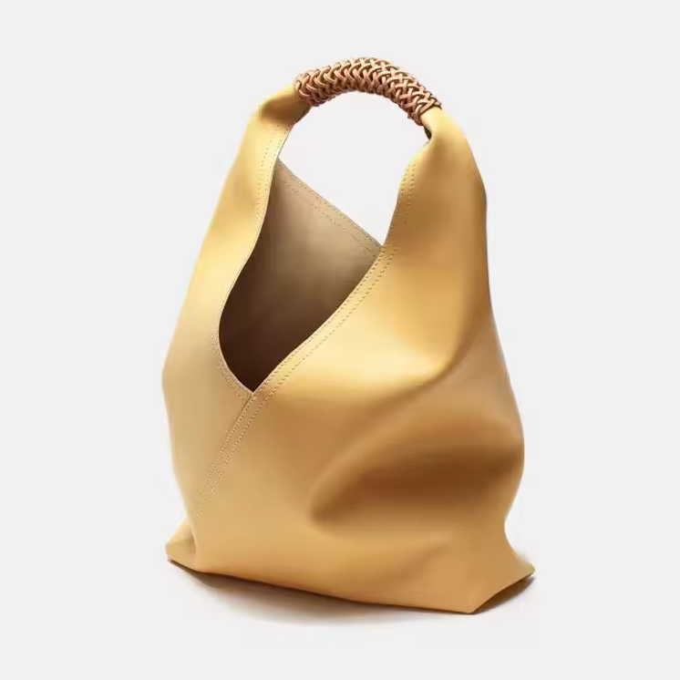 grandeur luxe leather bucket bag office look