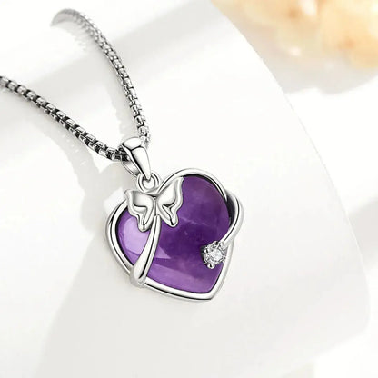 amethyst heart necklace butterfly accent close up