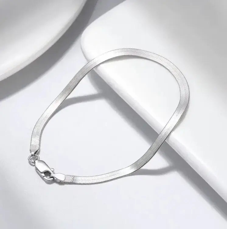 herringbone chain bracelet in cool-toned sterling silver