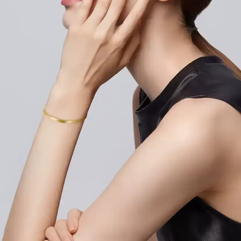 snake style gold bracelet with refined shine