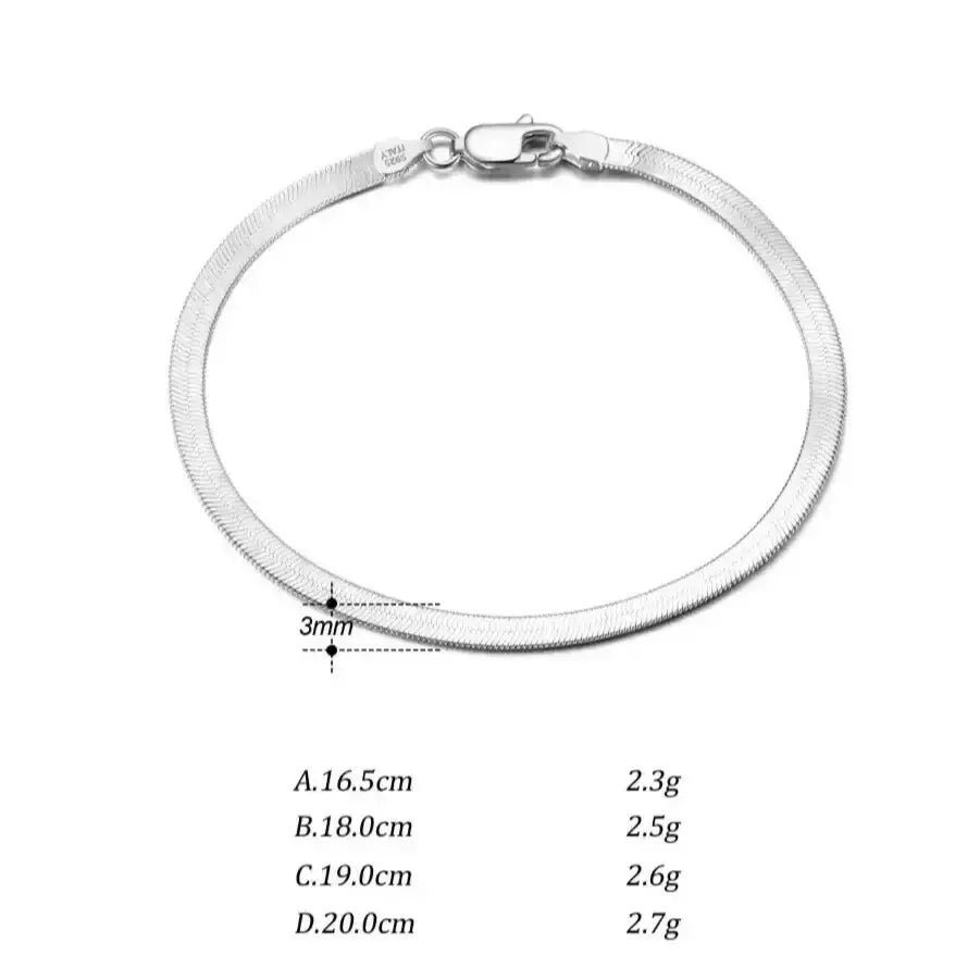 classic herringbone bracelet in polished silver detail