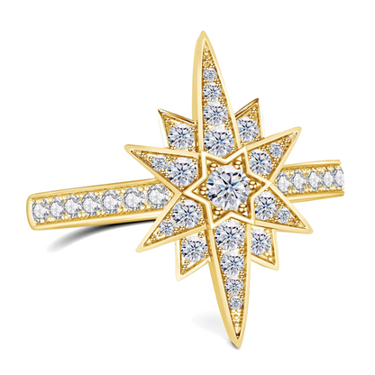 Close-up of prong-set moissanite star ring in gold