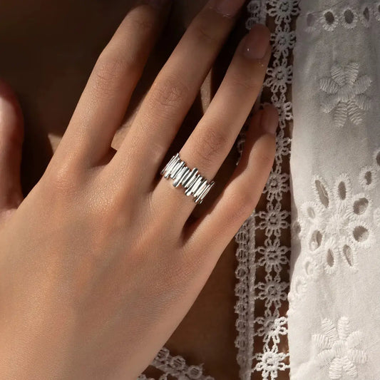 925 sterling silver wide-band ring on hand