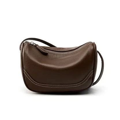 coffee leather crossbody phone bag worn across the body