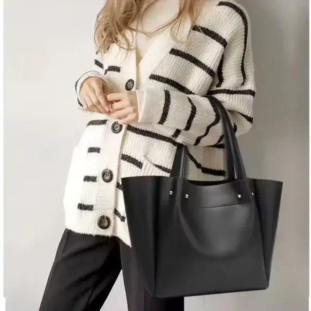 UrbanEase black tote bag styled as crossbody