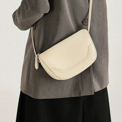 Women’s leather phone bag — shoulder carry, compact and organised