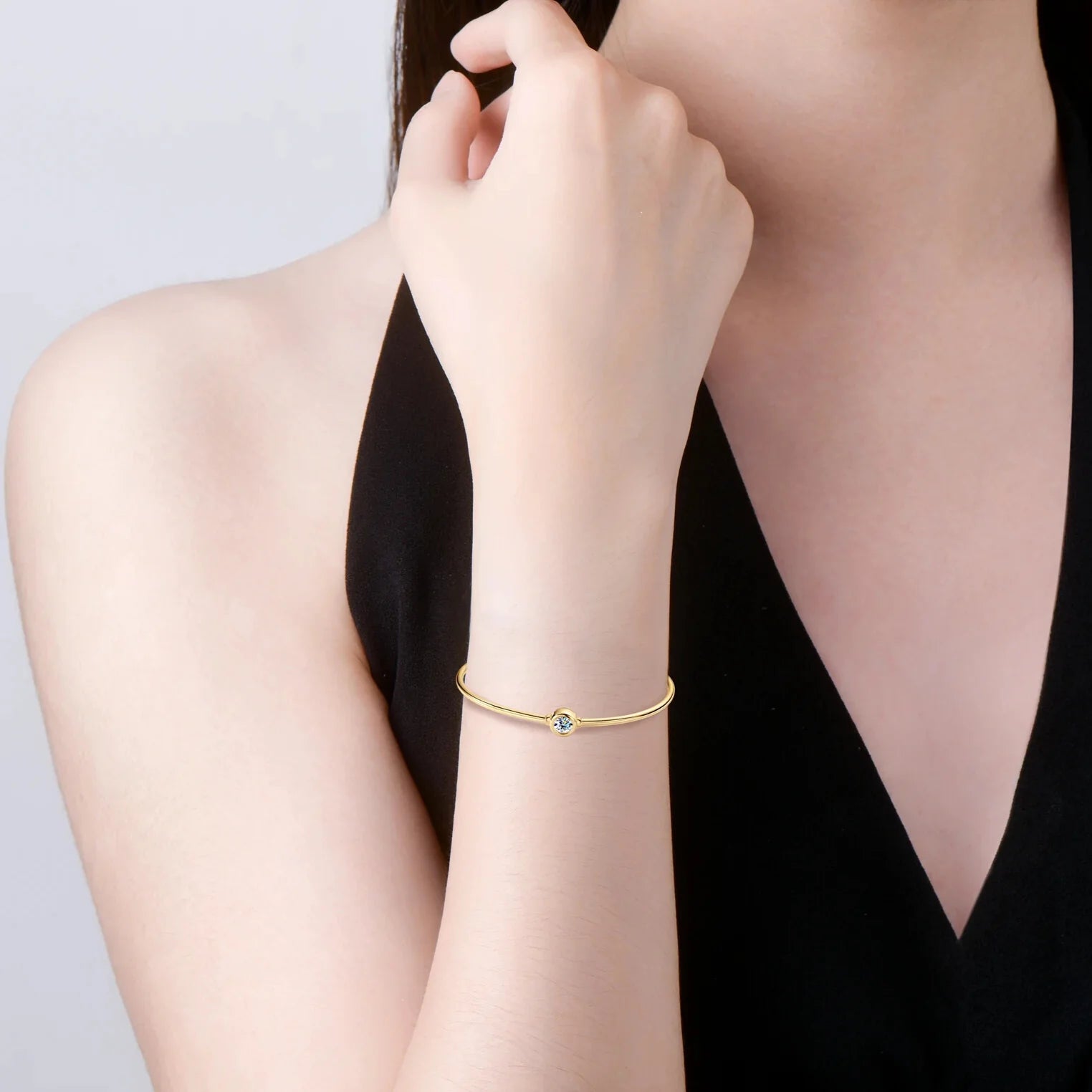 Classic moissanite bangle styled for everyday elegance
