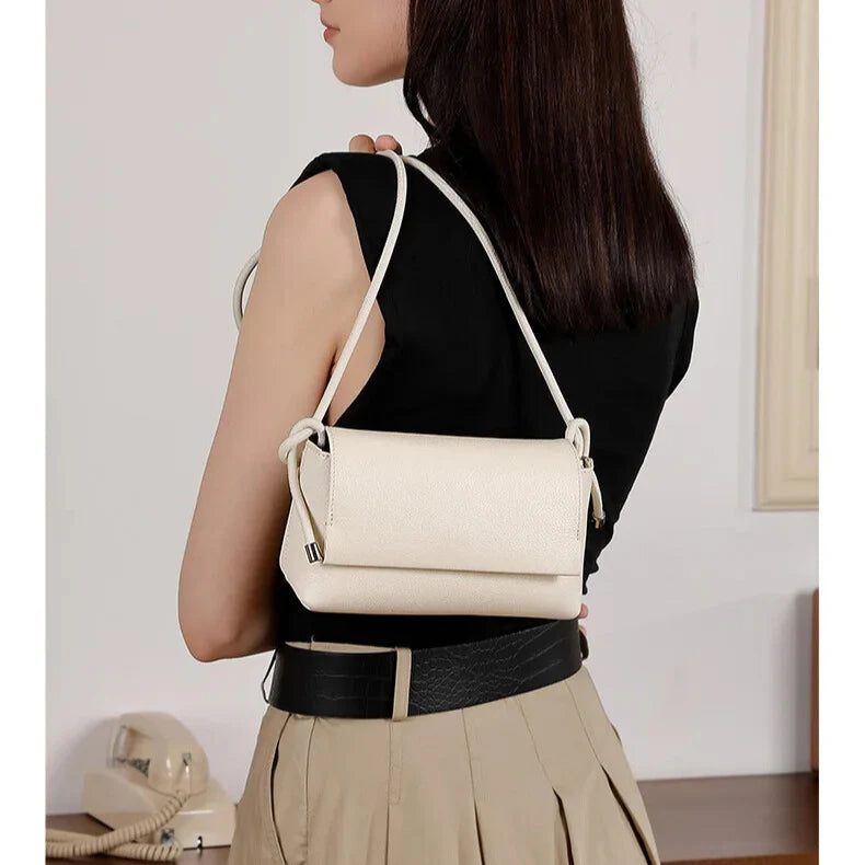 Quiet luxury women’s crossbody — lifestyle scene
