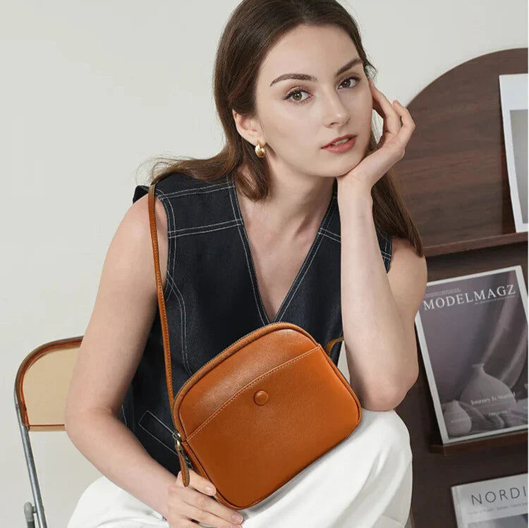 Charméa Mini — genuine leather mini crossbody, square design (front view)