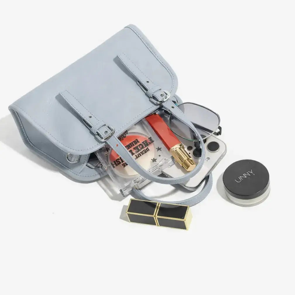 minimalist baby blue leather bag organised interior