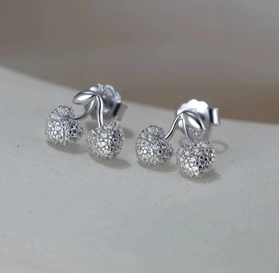 elegant silver cherry studs lifestyle photo
