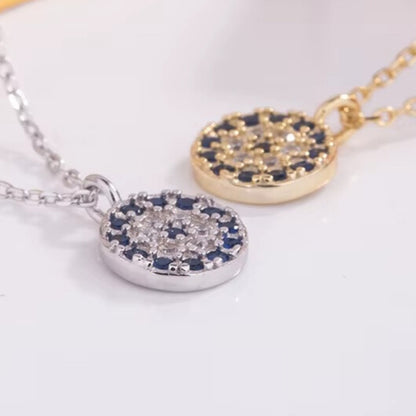 Layered necklaces featuring the dainty evil eye CZ charm