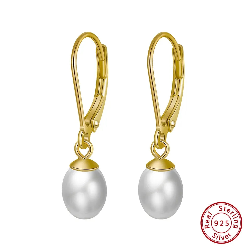 timeless gold pearl earrings modern feminine style
