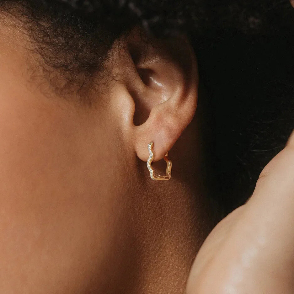 minimalist gold plated 18k wave hoops evening styling