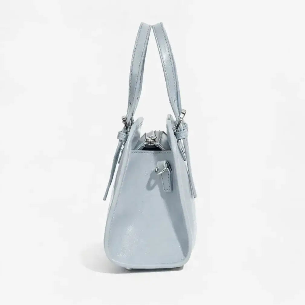 soft structured leather crossbody bag baby blue side view