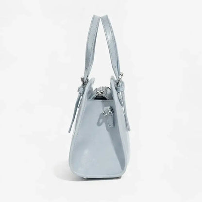 soft structured leather crossbody bag baby blue side view