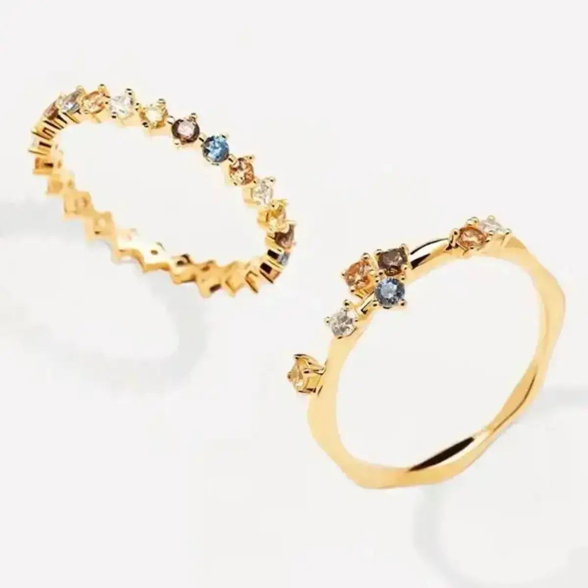 Gold eternity band in 925 sterling silver with multicolour stones.