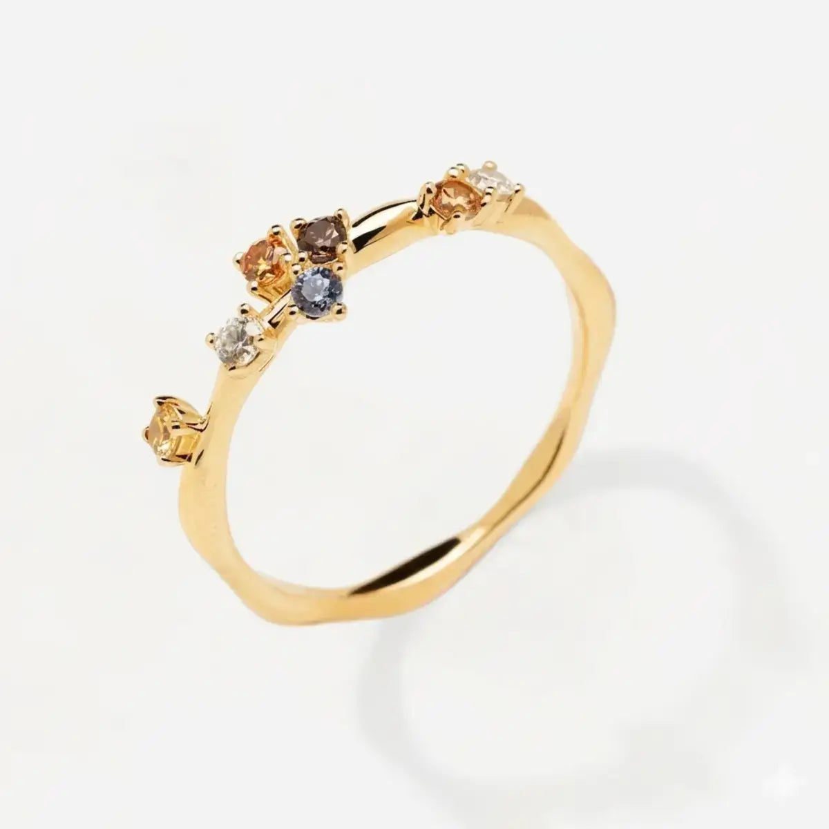 Zircon half eternity ring in 925 sterling silver with colourful stones across the top.