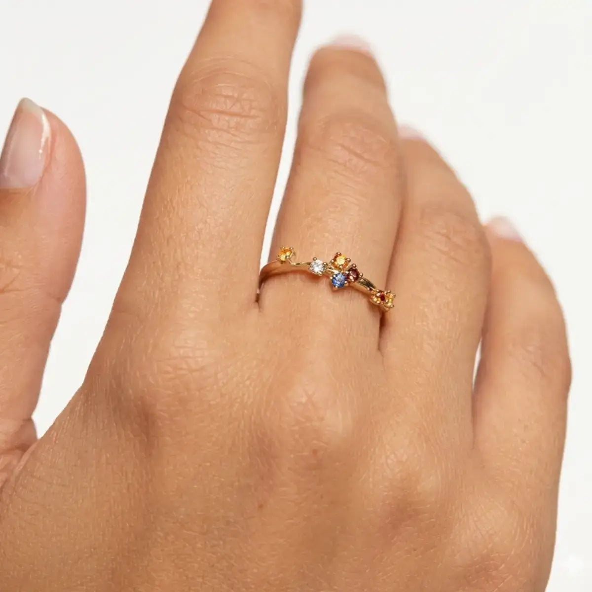 Multicolor zircon half eternity ring in 925 sterling silver designed for elegant stacking.