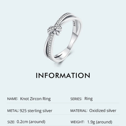 Vintage knot band ring, sterling silver CZ, platinum-plated finish information