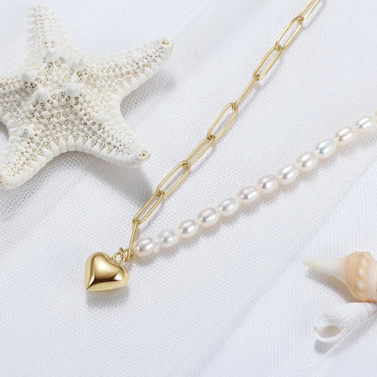 Heart charm pearl necklace, elegant women’s jewellery