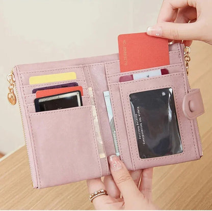 Pink travel-friendly small tri-fold wallet