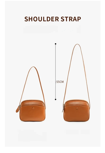 Mini square handbag with adjustable strap in black leather