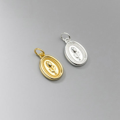 Gold and silver tulip pendant close up