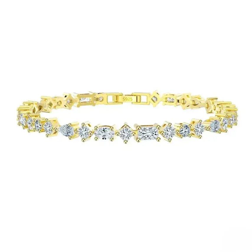 gold-finish tennis bracelet with round, oval and teardrop zircon stones