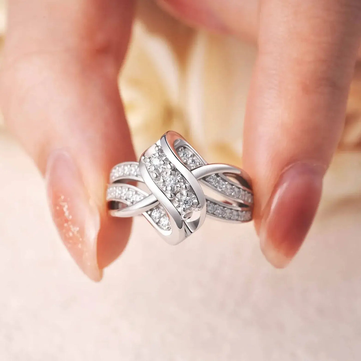 round-cut cubic zirconia detail on knot design