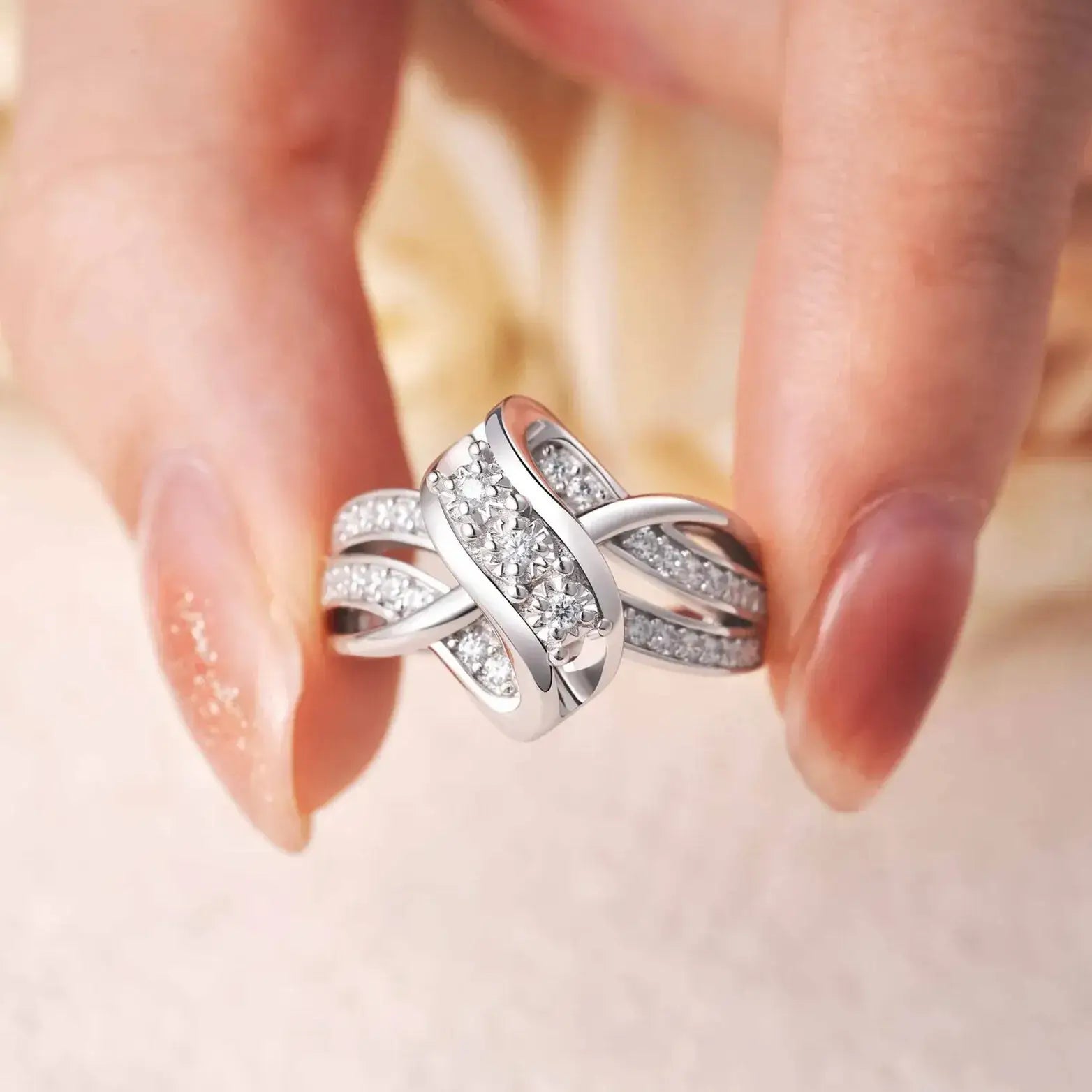 round-cut cubic zirconia detail on knot design