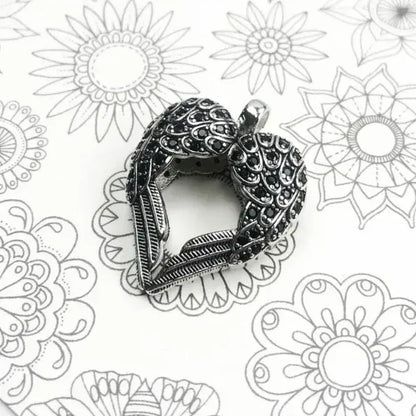 luxury sterling silver pendant symbolising love and freedom