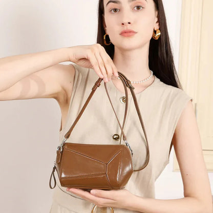 Adjustable strap for shoulder or crossbody wear — elegant leather bag