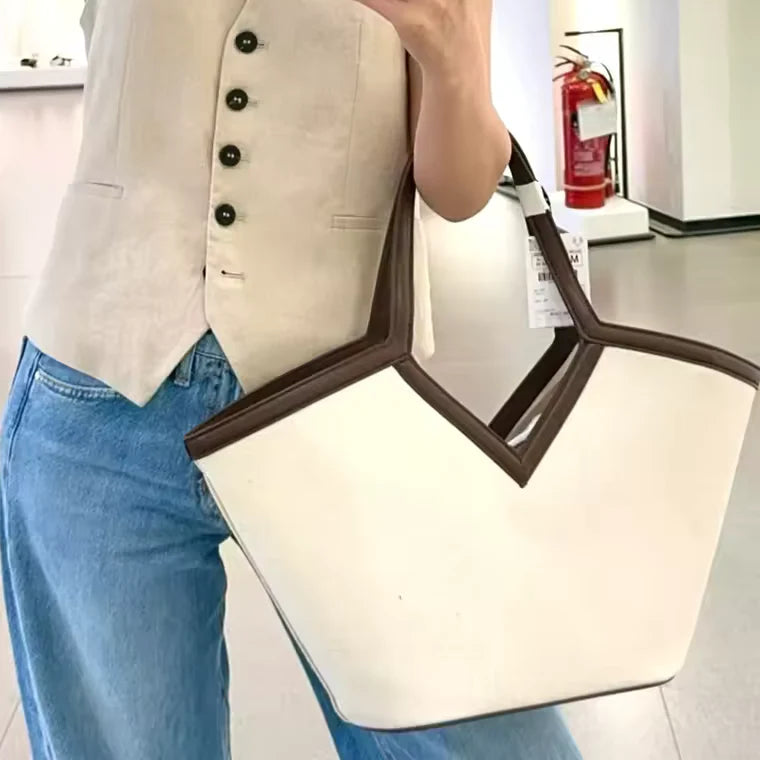 VersaCharm tote — drawstring closure and minimalist silhouette