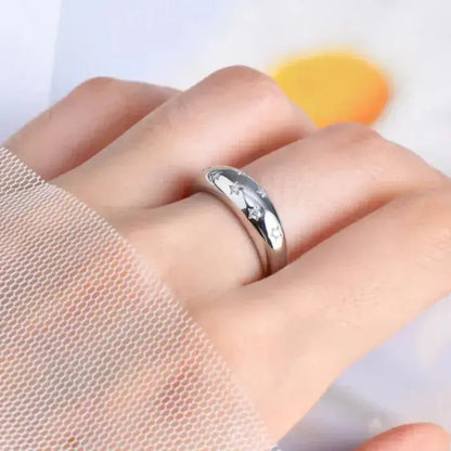 chunky silver statement ring on hand