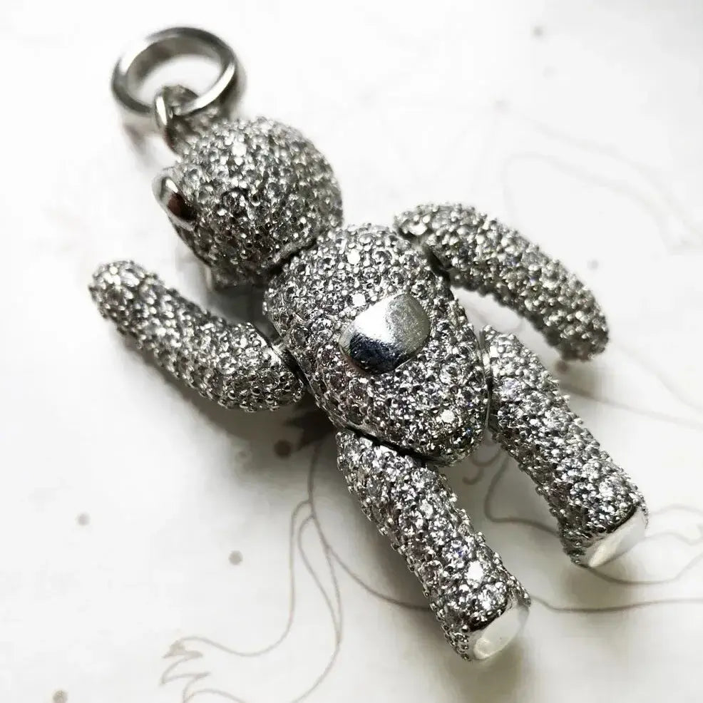 pendant detail showing zircon sparkle and polish back view