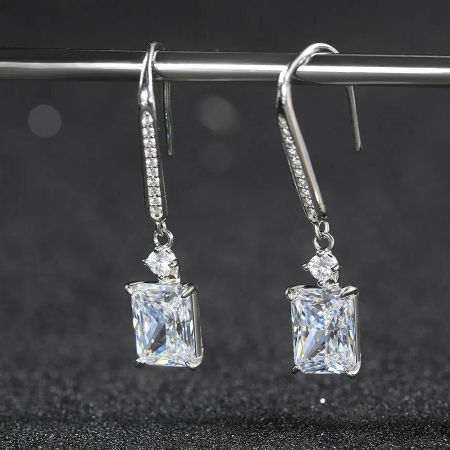 shiny polished sterling silver dangle earrings close up