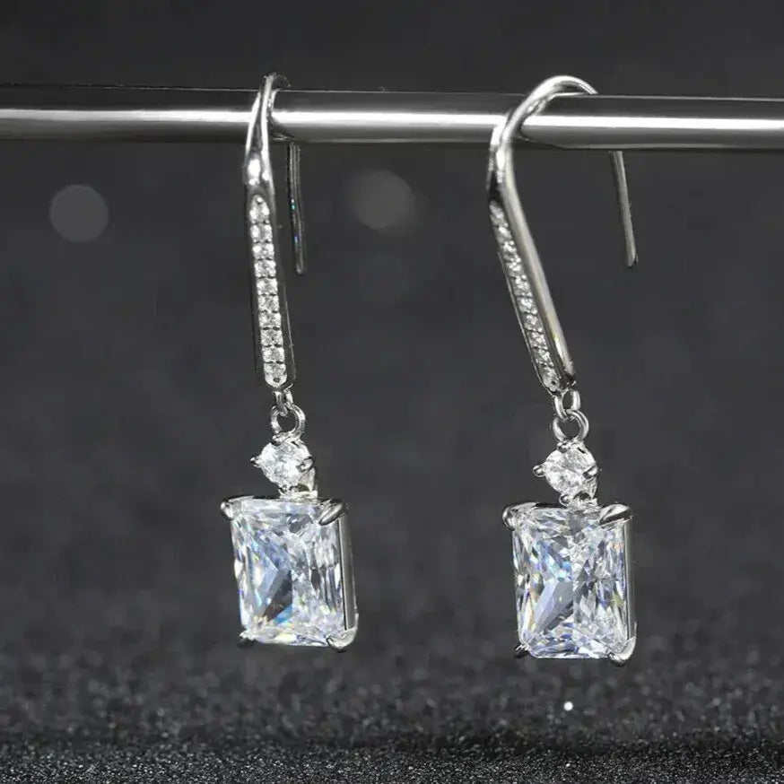 shiny polished sterling silver dangle earrings close up