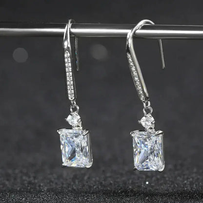 shiny polished sterling silver dangle earrings close up