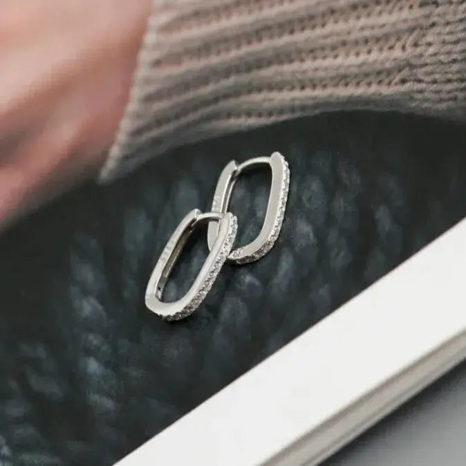 sterling silver hoops reflective shine
